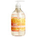 A bottle of Seventh Generation Mandarin Orange & Grapefruit liquid hand soap with a pump.