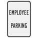 A white rectangular sign with black text reading "Employee Parking" and a diamond grade border.