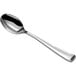 A close-up of a Visions silver plastic spoon with a silver handle.