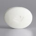 A white Dove Beauty Bar soap with a bird carved on it.