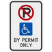 A white and black Lavex aluminum sign that says "Handicapped Parking by Permit Only"