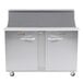 A large stainless steel Traulsen refrigerated sandwich prep table with one left hinged and one right hinged door.