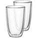Two Villeroy & Boch Artesano double wall glass cups with lids.