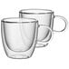 Two clear glass Villeroy & Boch Artesano Barista cups with handles.