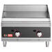 A Cooking Performance Group chrome plated liquid propane countertop griddle with two burners and two knobs.