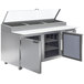 A Beverage-Air stainless steel refrigerated prep table with two clear glass doors.