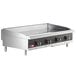 A Cooking Performance Group chrome plated liquid propane countertop griddle with four burners.