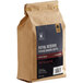 A brown and white bag of Crown Beverages Royal Reserve Guatemalan Coarse Ground Coffee.