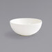 A close up of a Front of the House European White porcelain ramekin.
