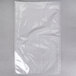 A clear ARY VacMaster vacuum packaging bag with a crease on a gray surface.