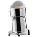 A silver Ceado S98 electric citrus juicer with an orange inside.