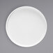 A Front of the House bright white porcelain plate with a raised rim on a white background.