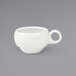 A stackable white Front of the House Monaco porcelain cup with a handle.