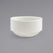 A Front of the House Monaco white porcelain bouillon bowl on a gray surface.