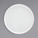 A white Front of the House Soho porcelain platter with a raised rim.