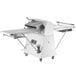 A white and silver Estella floor dough sheeter with wheels and a handle.