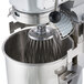 A Galaxy Planetary Stand Mixer with a wire whisk attached.