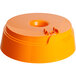 An orange plastic lid with a hole for a juicer.