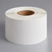 A roll of Lavex white thermal transfer labels.