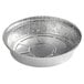 A round silver Choice heavy weight foil take-out pan with a round rim.