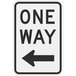 A white and black aluminum sign with the text "One Way" and a left arrow.