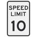 A white and black rectangular sign with black text reading "Speed Limit 10" above a black "MPH" symbol.