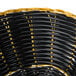 A black and yellow wicker Thunder Group oval basket.