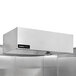 A stainless steel Halifax commercial kitchen conveyor pizza oven hood system.