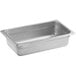 A Carlisle stainless steel hotel pan on a white counter.
