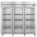 A white Hoshizaki glass door reach-in refrigerator with shelves on wheels.