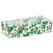 A white rectangular box with green and red holly leaves on it.