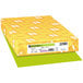 A yellow package of Astrobrights Terra Green color paper with white text.