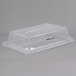 A clear plastic rectangular bakery tray cover with a long hinge.