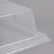 A clear plastic Cal-Mil rectangular bakery tray cover with long hinge.