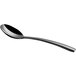 A close-up of a Chef & Sommelier stainless steel dessert spoon with a black handle.