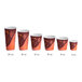 A row of Choice paper hot cups in different sizes with a coffee print on one.