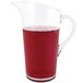 A Front of the House plastic pitcher with red liquid inside.