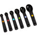A close-up of a OXO black measuring spoon set with different colored markings.
