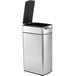 A simplehuman brushed stainless steel rectangular touch bar trash can with a black lid.