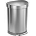 A simplehuman brushed stainless steel semi-round step-on trash can with a lid.