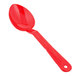 A close-up of a red Thunder Group salad bar spoon with a hole in the handle.