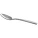 A World Tableware stainless steel demitasse spoon with a curved silver handle.
