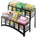 A Cal-Mil black steel two tier rack with six jars holding yellow and green tea bags.