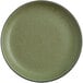 An Acopa Moss Green Matte coupe stoneware plate with a brown rim.