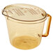 A clear plastic Cambro measuring cup with a handle and lid.