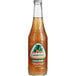 A close up of a Jarritos Tamarind Soda bottle with a label.