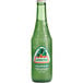 A green Jarritos bottle of grapefruit soda.