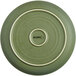 A close-up of an Acopa Moss Green Matte stoneware plate with a circular design in white.