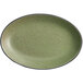 An Acopa moss green stoneware platter with a black rim.