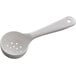 A white plastic portion spoon with holes on the bottom.